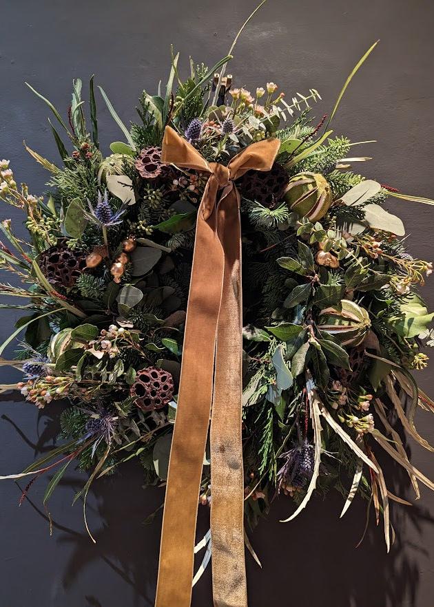 An example of our Christmas wreath, with an iconic bronze bow and thistles